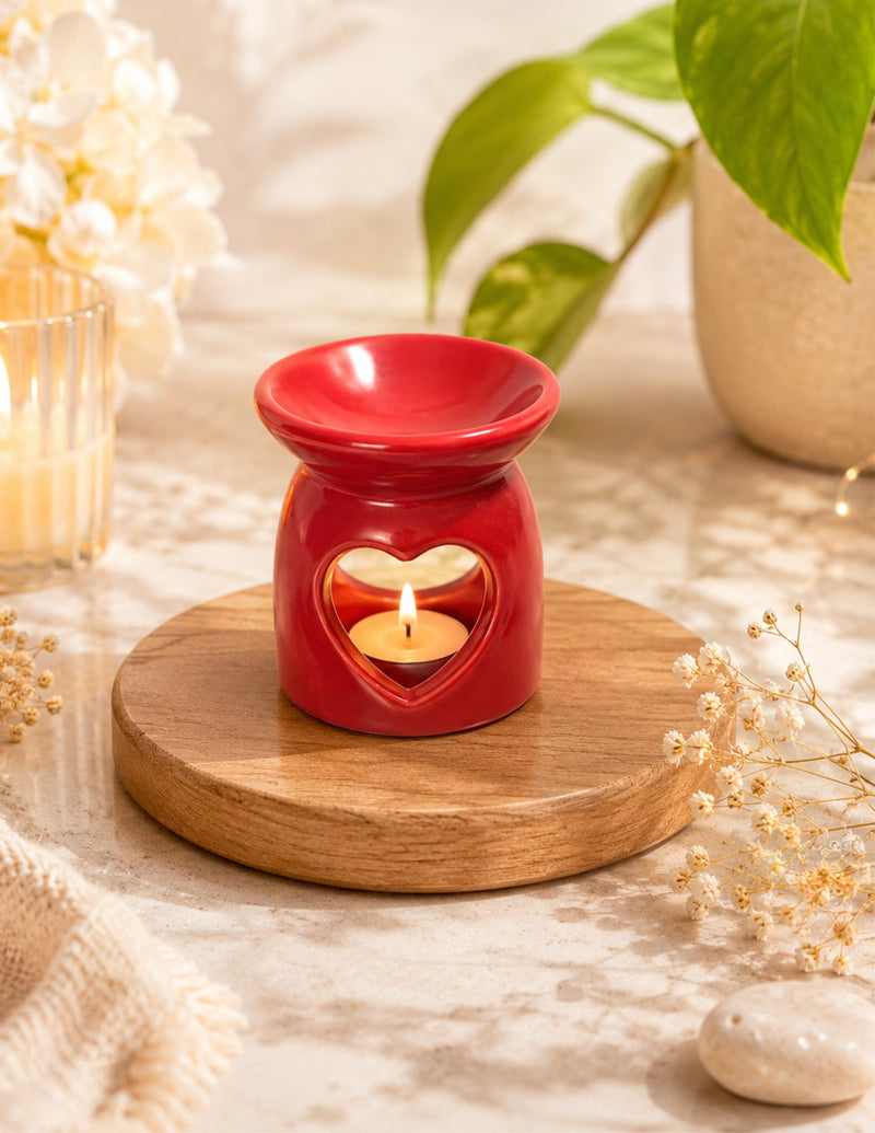 Red mini heart cutout ceramic tealight oil diffuser with candle lit