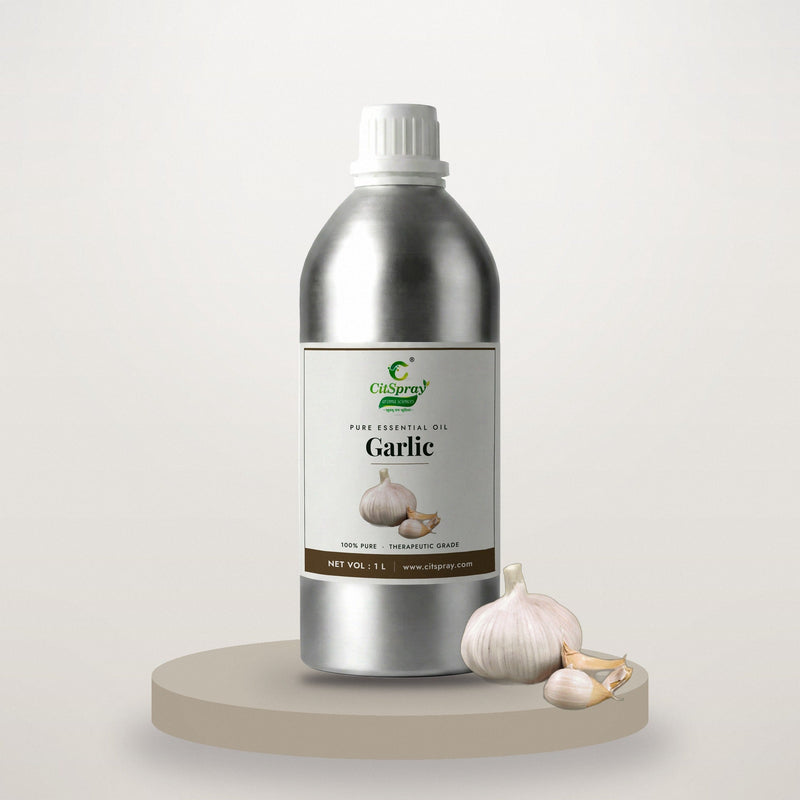 Garlic essential oil by CitSpray in a 1 litre aluminium bottle with garlic cloves