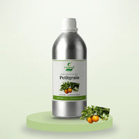 Petitgrain essential oil by CitSpray in a 1 litre aluminium bottle with bitter orange leaves thumbnail 1